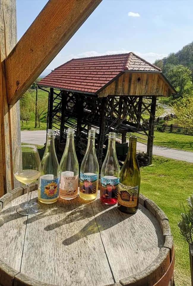 Keltis bottles on a barrel in the vineyard