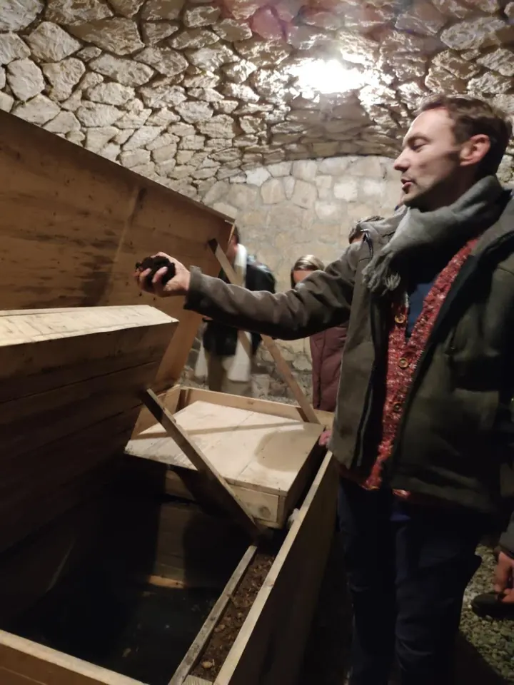 A winemaker at Meinklang in the cellar